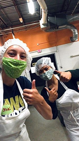 Aurora Greane and Claire Mitchell, Service & Support Interns, helped out at the Second Harvest Food Bank in Madison by bagging avocados and sorting tomatoes to be donated to families in need.