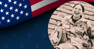 Image of Kara in uniform next to an American flag