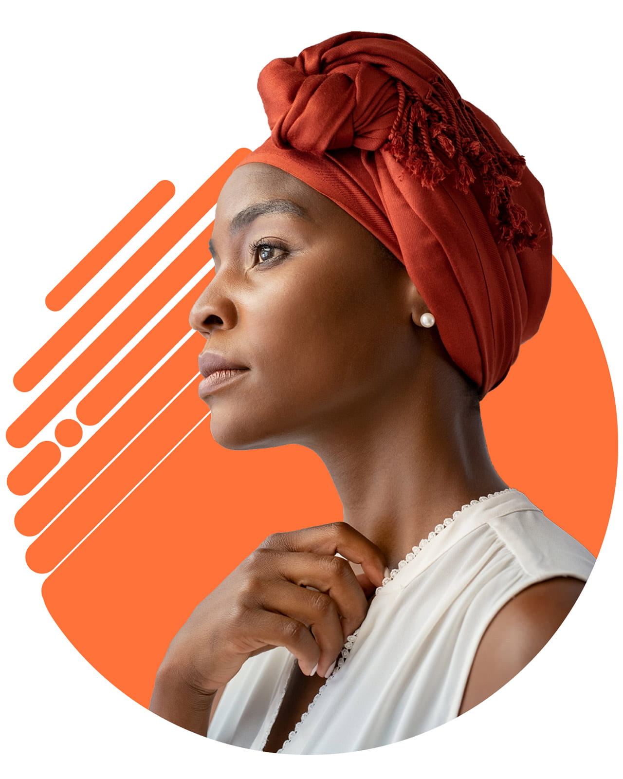A woman in a headwrap looking off into the distance.