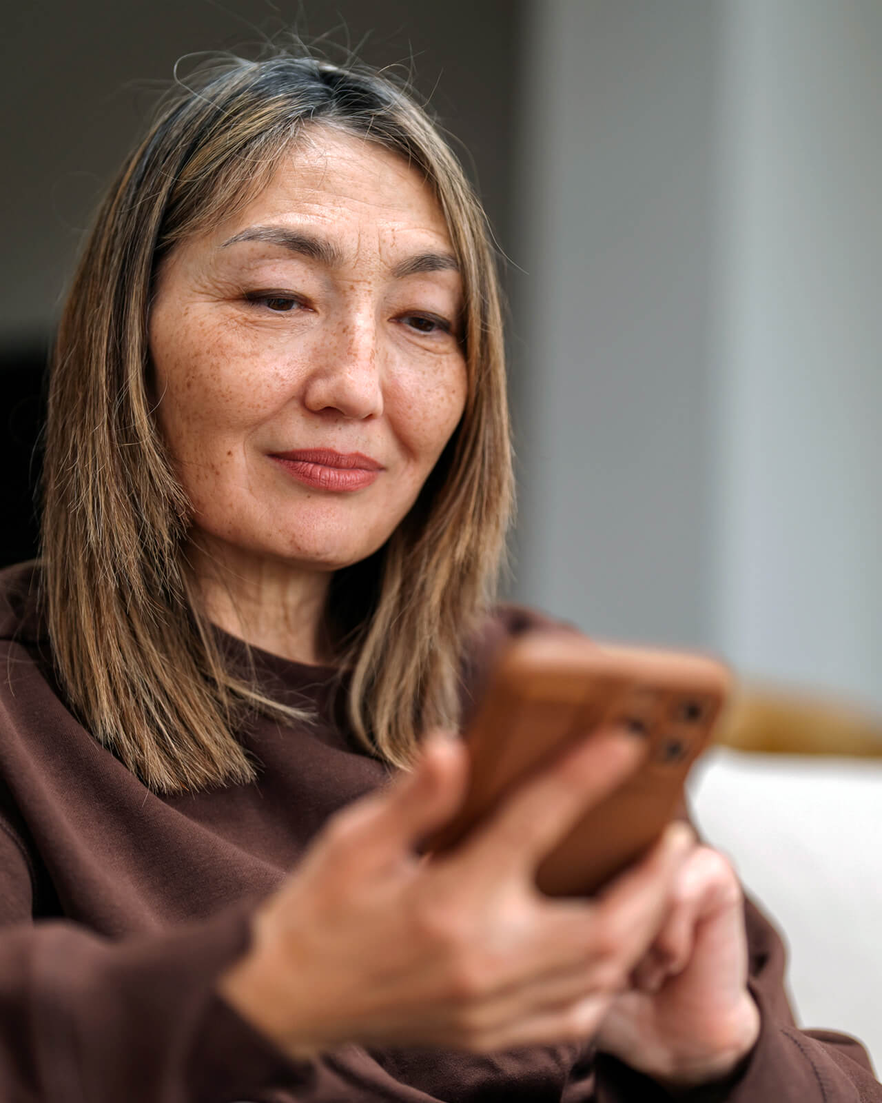 A woman using a mobile device.