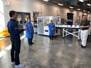 The COVID-19 effort is taking place in parallel with the continued operation of Exact Sciences' Cologuard and Oncotype DX businesses. In this photo, Exact Sciences chairman and CEO, Kevin Conroy, speaks to lab team members about the company's ongoing efforts to serve cancer patients and the broader community.